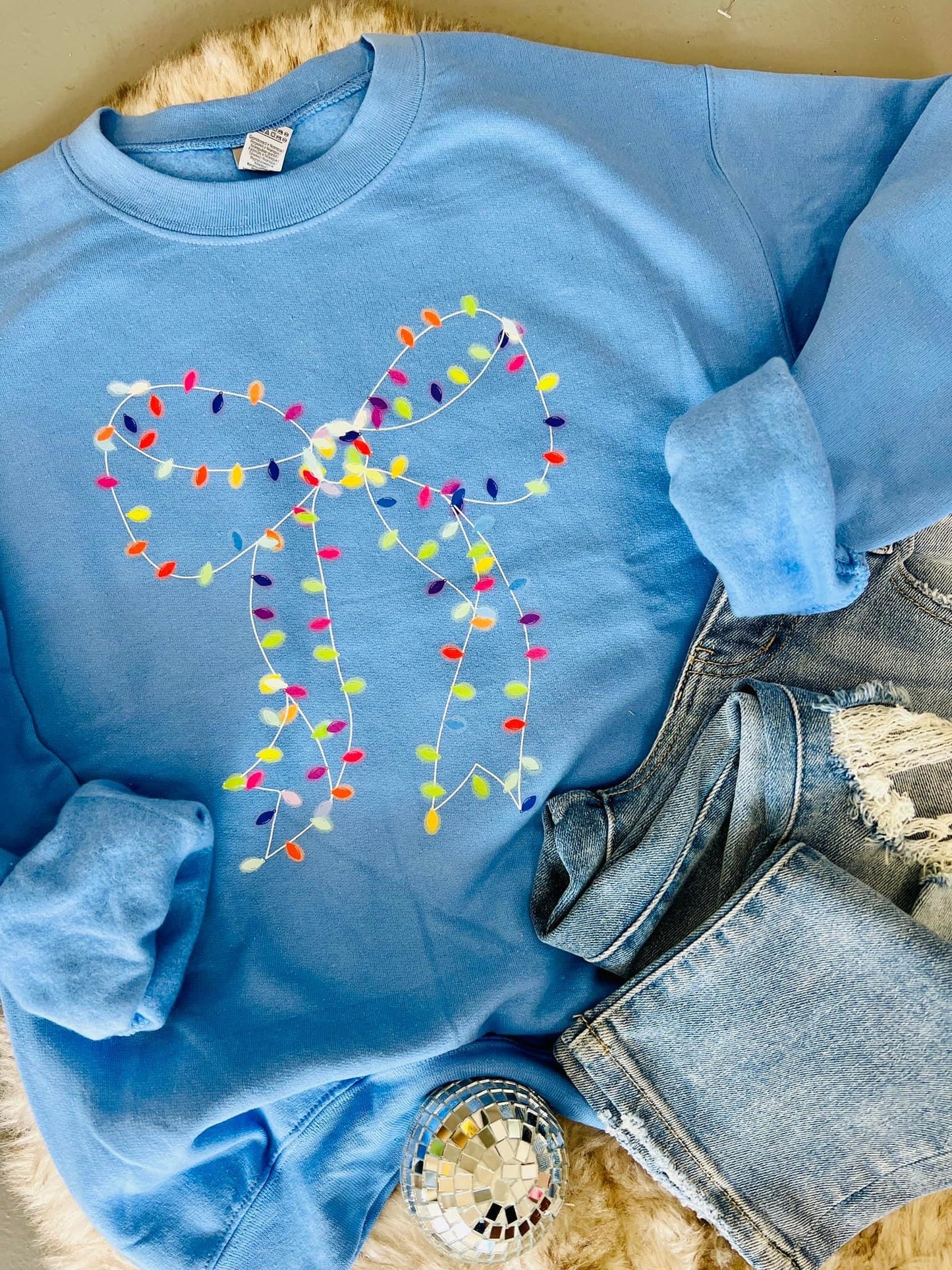 CHRISTMAS LIGHTS BOW - BLUE CREWNECK