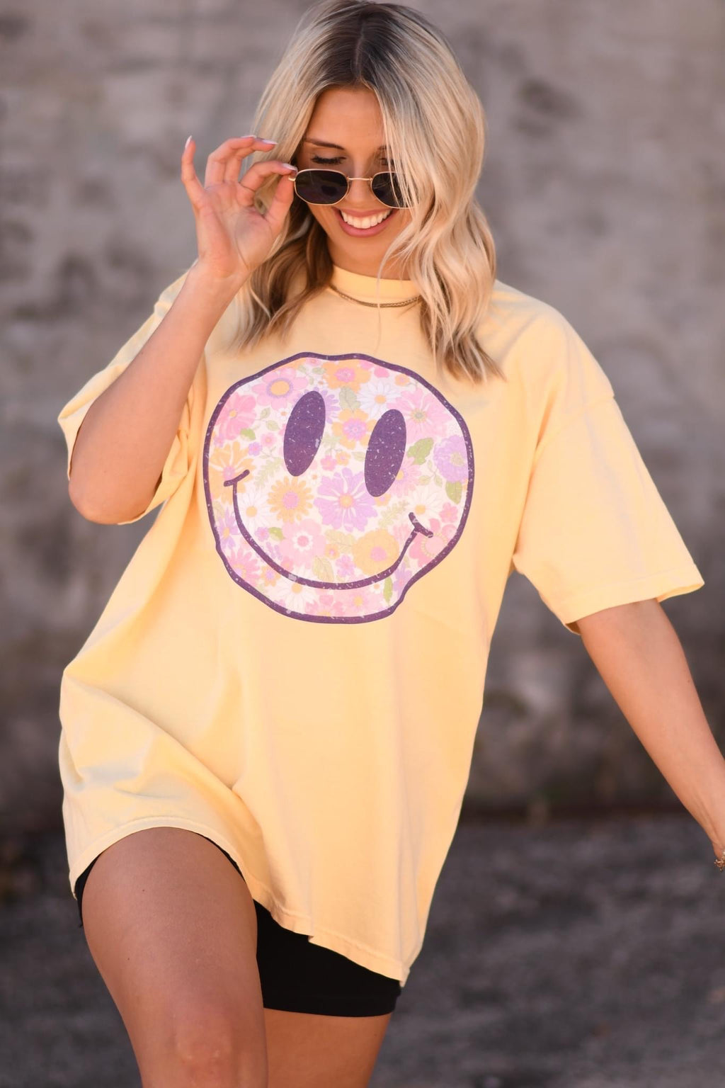 PURPLE FLORAL SMILEY - BANANA TEE