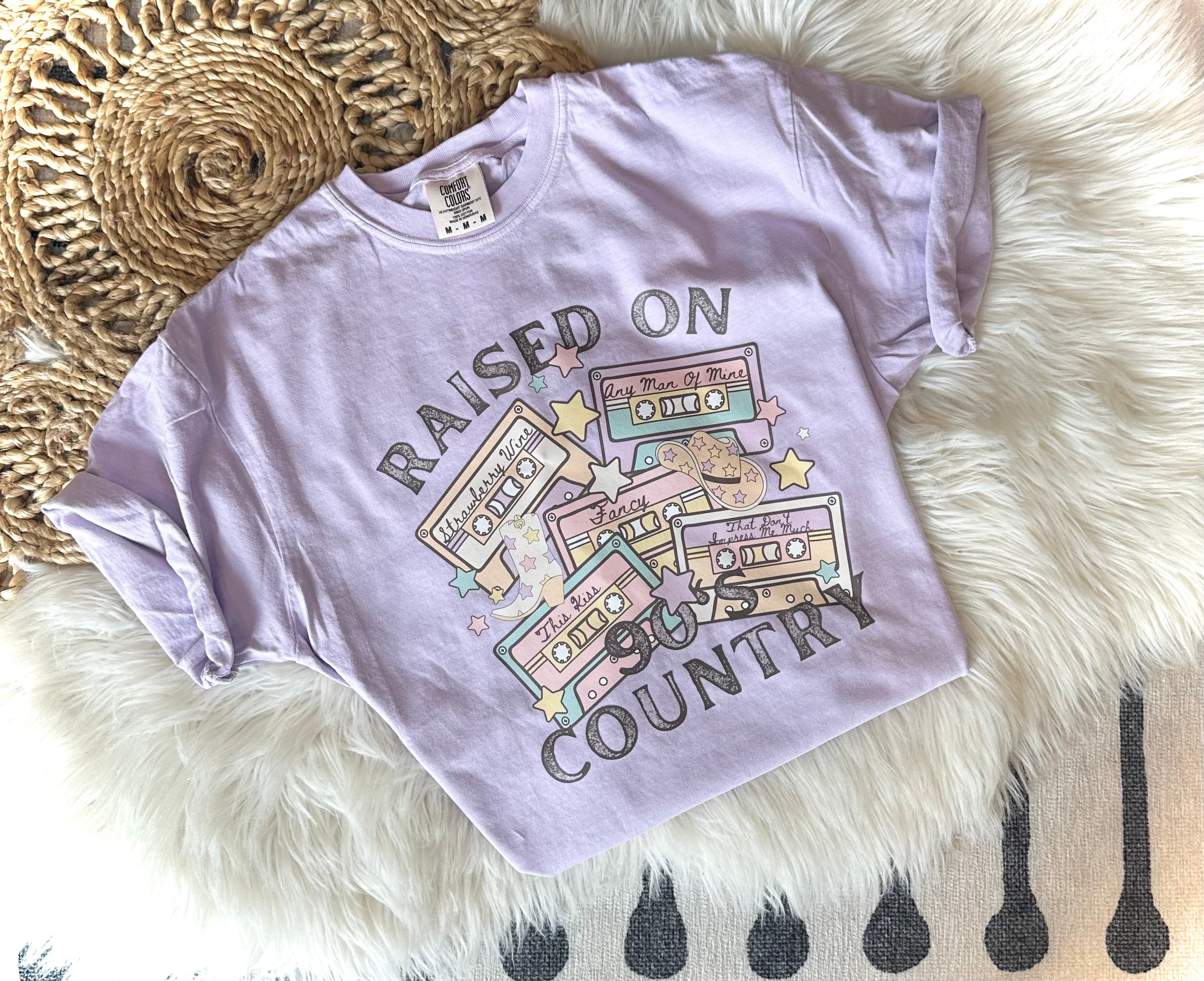 RAISED ON 90’s COUNTRY - ORCHID TEE