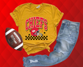 KANSAS CITY FOOTBALL CHECKERED WITH DOODLE STARS - MUSTARD TEE